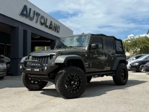 Green 2015 Jeep Wrangler Unlimited Sport for sale in Jacksonville, FL
