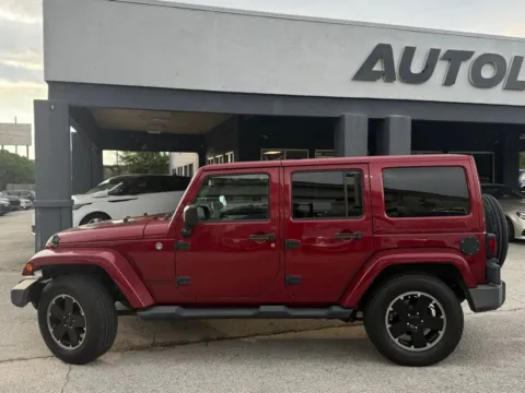 Photos of 2012 Jeep Wrangler Unlimited Sahara for sale in Jacksonville, FL at AUTOLAND