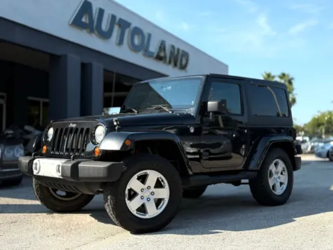 Black 2012 Jeep Wrangler Sahara for sale in Jacksonville, FL