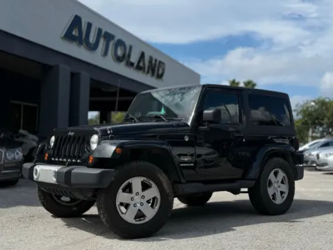 Black 2012 Jeep Wrangler Sahara for sale in Jacksonville, FL