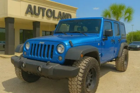 Blue 2016 Jeep Wrangler Unlimited Sport for sale in Jacksonville, FL