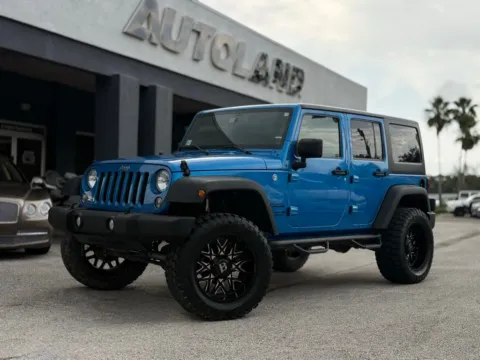 Blue 2016 Jeep Wrangler Unlimited Sport for sale in Jacksonville, FL