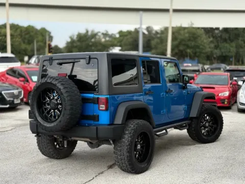 More photos of 2016 Jeep Wrangler Unlimited Sport at AUTOLAND, FL