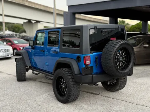 Another view of 2016 Jeep Wrangler Unlimited Sport for sale in Jacksonville, FL at AUTOLAND