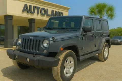 Gray 2015 Jeep Wrangler Unlimited Sport for sale in Jacksonville, FL