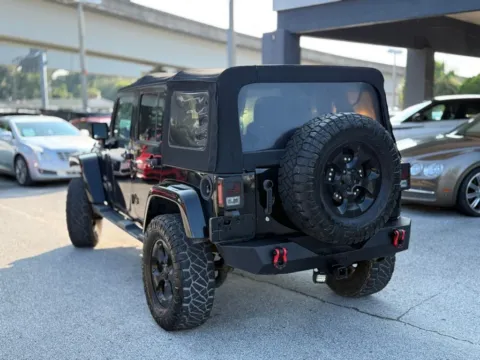 Another view of 2016 Jeep Wrangler Unlimited Sahara for sale in Jacksonville, FL at AUTOLAND