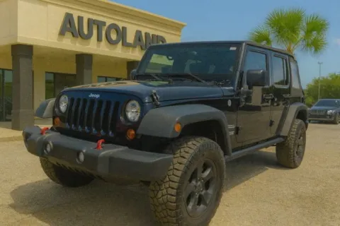 Black 2016 Jeep Wrangler Unlimited Sahara for sale in Jacksonville, FL