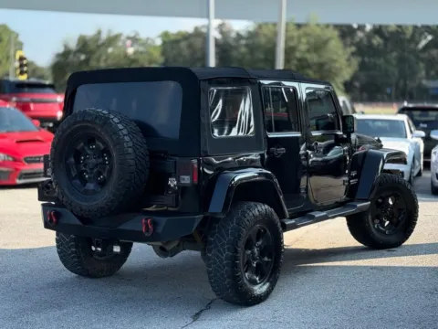 More photos of 2016 Jeep Wrangler Unlimited Sahara at AUTOLAND, FL