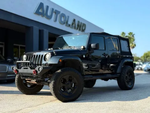 Black 2016 Jeep Wrangler Unlimited Sahara for sale in Jacksonville, FL