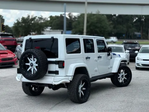 More photos of 2013 Jeep Wrangler Unlimited Sahara at AUTOLAND, FL
