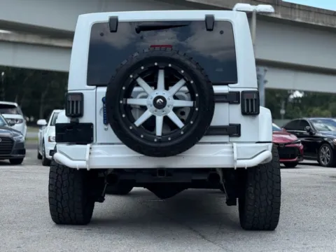 More photos of 2013 Jeep Wrangler Unlimited Sahara at AUTOLAND, FL