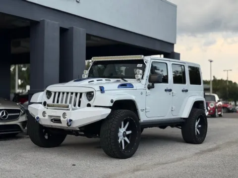 White 2013 Jeep Wrangler Unlimited Sahara for sale in Jacksonville, FL