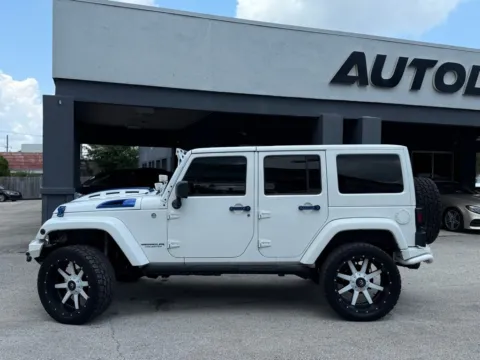 Photos of 2013 Jeep Wrangler Unlimited Sahara for sale in Jacksonville, FL at AUTOLAND