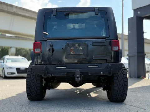 More photos of 2015 Jeep Wrangler Sport at AUTOLAND, FL