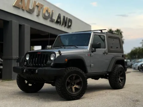 Silver 2017 Jeep Wrangler Willys Wheeler for sale in Jacksonville, FL