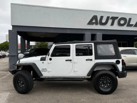 Another view of 2016 Jeep Wrangler Unlimited Sport for sale in Jacksonville, FL at AUTOLAND
