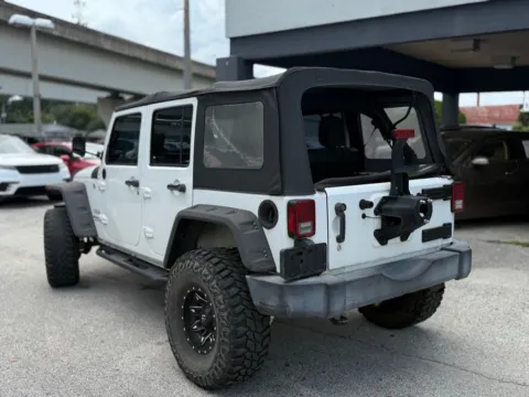 Another view of 2016 Jeep Wrangler Unlimited Sport for sale in Jacksonville, FL at AUTOLAND