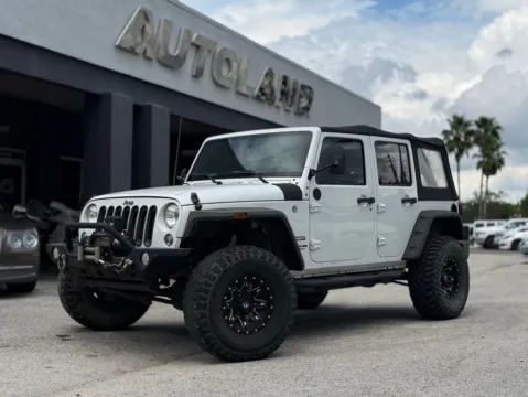 White 2016 Jeep Wrangler Unlimited Sport for sale in Jacksonville, FL