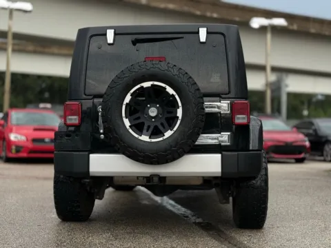 More photos of 2015 Jeep Wrangler Unlimited Sahara at AUTOLAND, FL