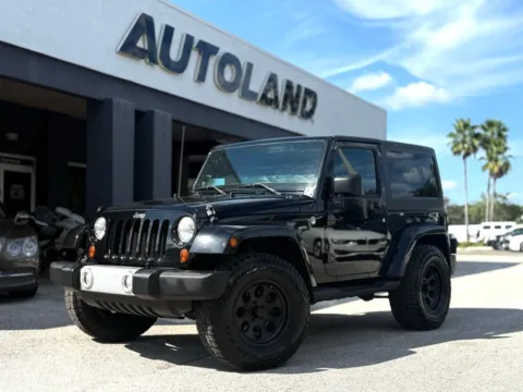 Black 2012 Jeep Wrangler Sahara for sale in Jacksonville, FL