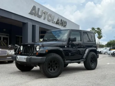 Black 2012 Jeep Wrangler Sahara for sale in Jacksonville, FL