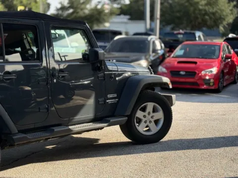 Another view of 2017 Jeep Wrangler Unlimited Sport for sale in Jacksonville, FL at AUTOLAND