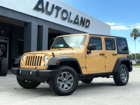 Brown 2014 Jeep Wrangler Unlimited Rubicon for sale in Jacksonville, FL