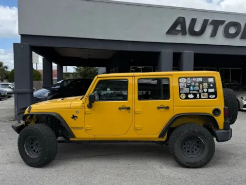 Another view of 2015 Jeep Wrangler Unlimited Sahara for sale in Jacksonville, FL at AUTOLAND