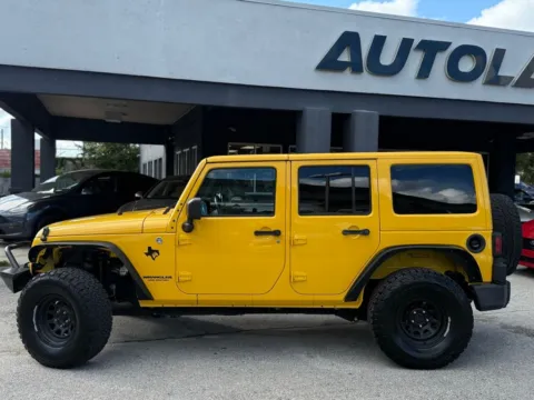 Another view of 2015 Jeep Wrangler Unlimited Sahara for sale in Jacksonville, FL at AUTOLAND