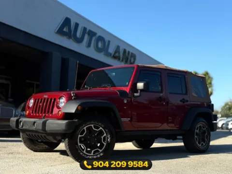Red 2013 Jeep Wrangler Unlimited Rubicon for sale in Jacksonville, FL
