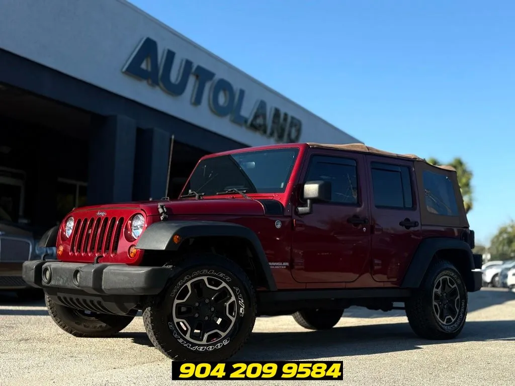 Red 2013 Jeep Wrangler Unlimited Rubicon for sale in Jacksonville, FL