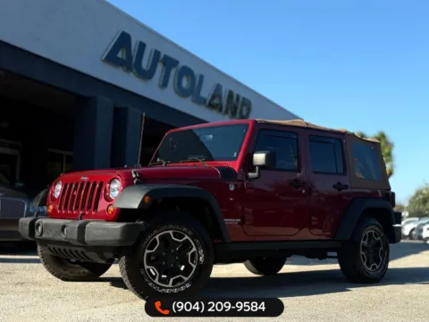 Red 2013 Jeep Wrangler Unlimited Rubicon for sale in Jacksonville, FL