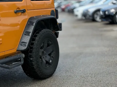 Another view of 2012 Jeep Wrangler Unlimited Sahara for sale in Jacksonville, FL at AUTOLAND