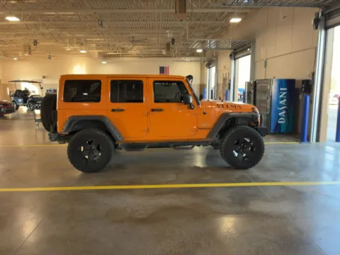Photos of 2012 Jeep Wrangler Unlimited Sahara for sale in Jacksonville, FL at AUTOLAND