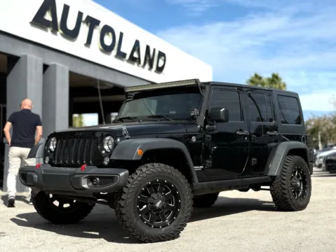 Black 2015 Jeep Wrangler Unlimited Sport for sale in Jacksonville, FL