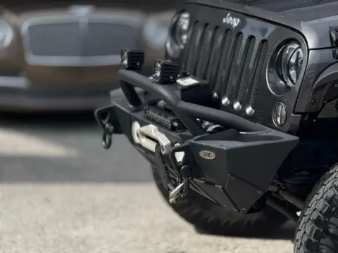 Photos of 2014 Jeep Wrangler Unlimited Sport for sale in Jacksonville, FL at AUTOLAND