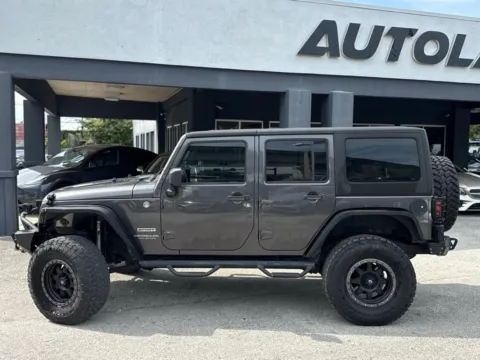More photos of 2014 Jeep Wrangler Unlimited Sport at AUTOLAND, FL
