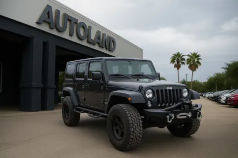 Gray 2014 Jeep Wrangler Unlimited Sport for sale in Jacksonville, FL