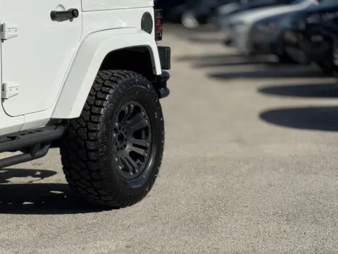 Another view of 2013 Jeep Wrangler Unlimited Sahara for sale in Jacksonville, FL at AUTOLAND