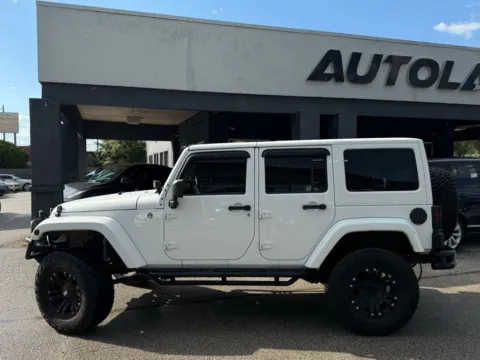 Another view of 2013 Jeep Wrangler Unlimited Sahara for sale in Jacksonville, FL at AUTOLAND
