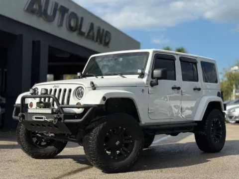 White 2013 Jeep Wrangler Unlimited Sahara for sale in Jacksonville, FL