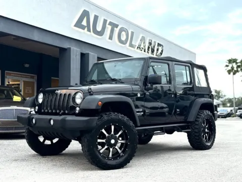 Black 2015 Jeep Wrangler Unlimited Sport for sale in Jacksonville, FL