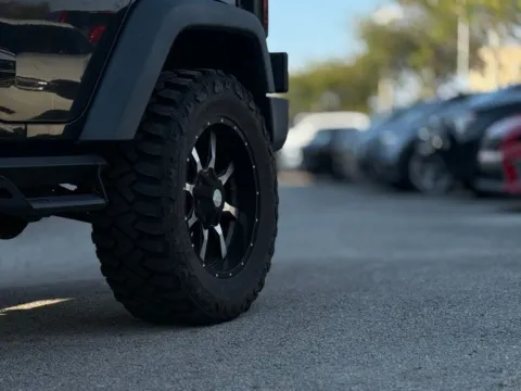 Another view of 2015 Jeep Wrangler Unlimited Sport for sale in Jacksonville, FL at AUTOLAND