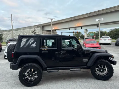 More photos of 2015 Jeep Wrangler Unlimited Sport at AUTOLAND, FL