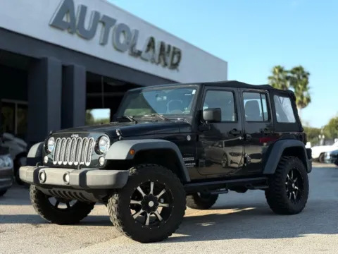 Black 2015 Jeep Wrangler Unlimited Sport for sale in Jacksonville, FL