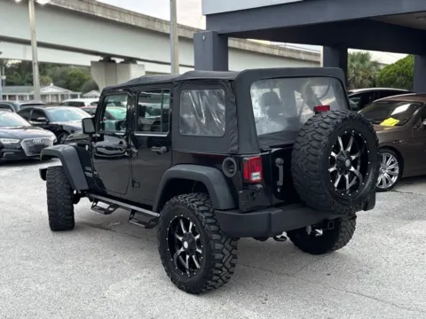More photos of 2015 Jeep Wrangler Unlimited Sport at AUTOLAND, FL