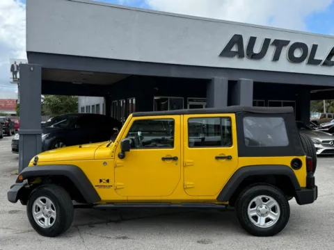 Another view of 2009 Jeep Wrangler Unlimited X for sale in Jacksonville, FL at AUTOLAND