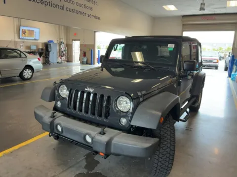 Gray 2017 Jeep Wrangler Unlimited Sport for sale in Jacksonville, FL