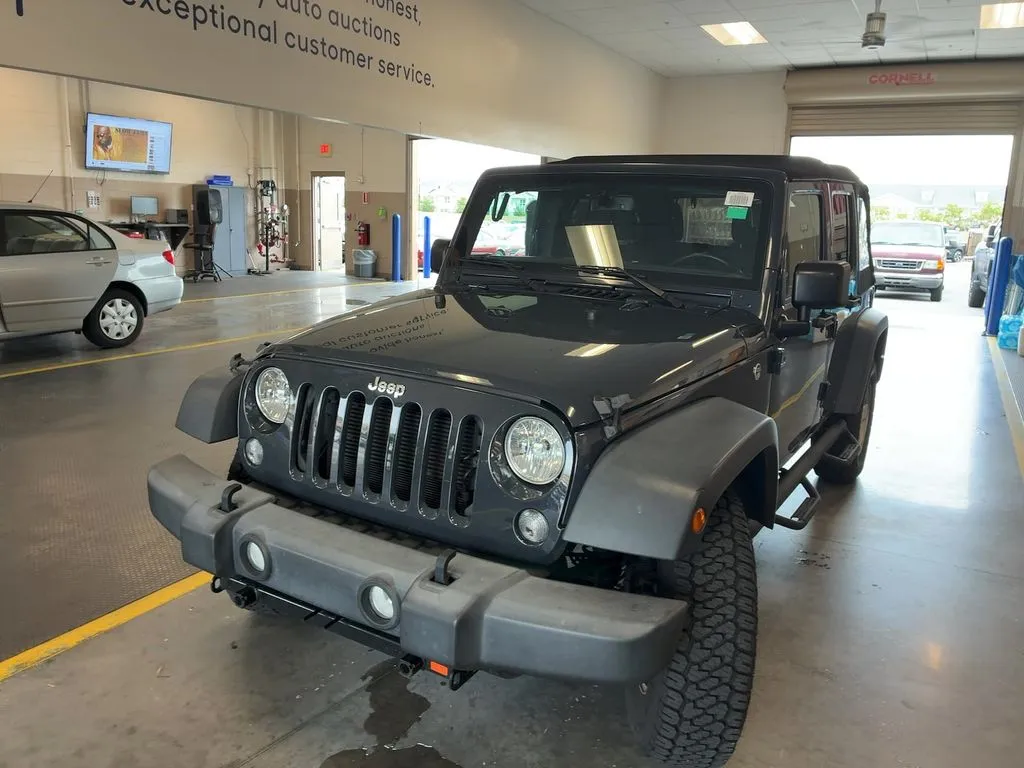Gray 2017 Jeep Wrangler Unlimited Sport for sale in Jacksonville, FL