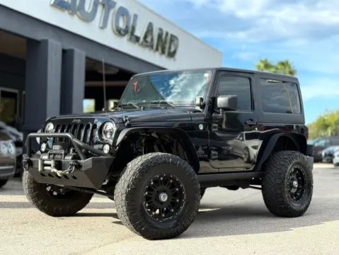 Black 2015 Jeep Wrangler Willys Wheeler for sale in Jacksonville, FL